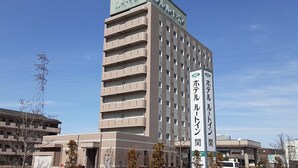 A multi-story hotel with a prominent sign indicating it is a Ryu Hotel. - Hotel Route-Inn Seki (Seki)