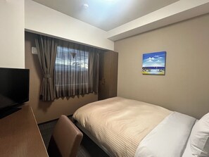 Desk, free WiFi, bed sheets