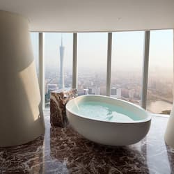 Combined shower/bathtub, rainfall showerhead, designer toiletries