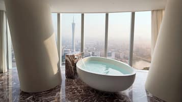 Premium bedding, down duvets, minibar, in-room safe