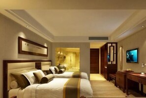 Minibar, desk, blackout curtains, iron/ironing board