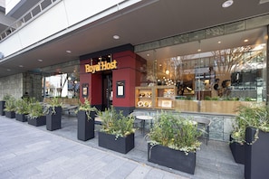 A restaurant named 'Royal Host' with outdoor seating and potted plants. - Richmond Hotel Nagoya Nayabashi (Nagoya)