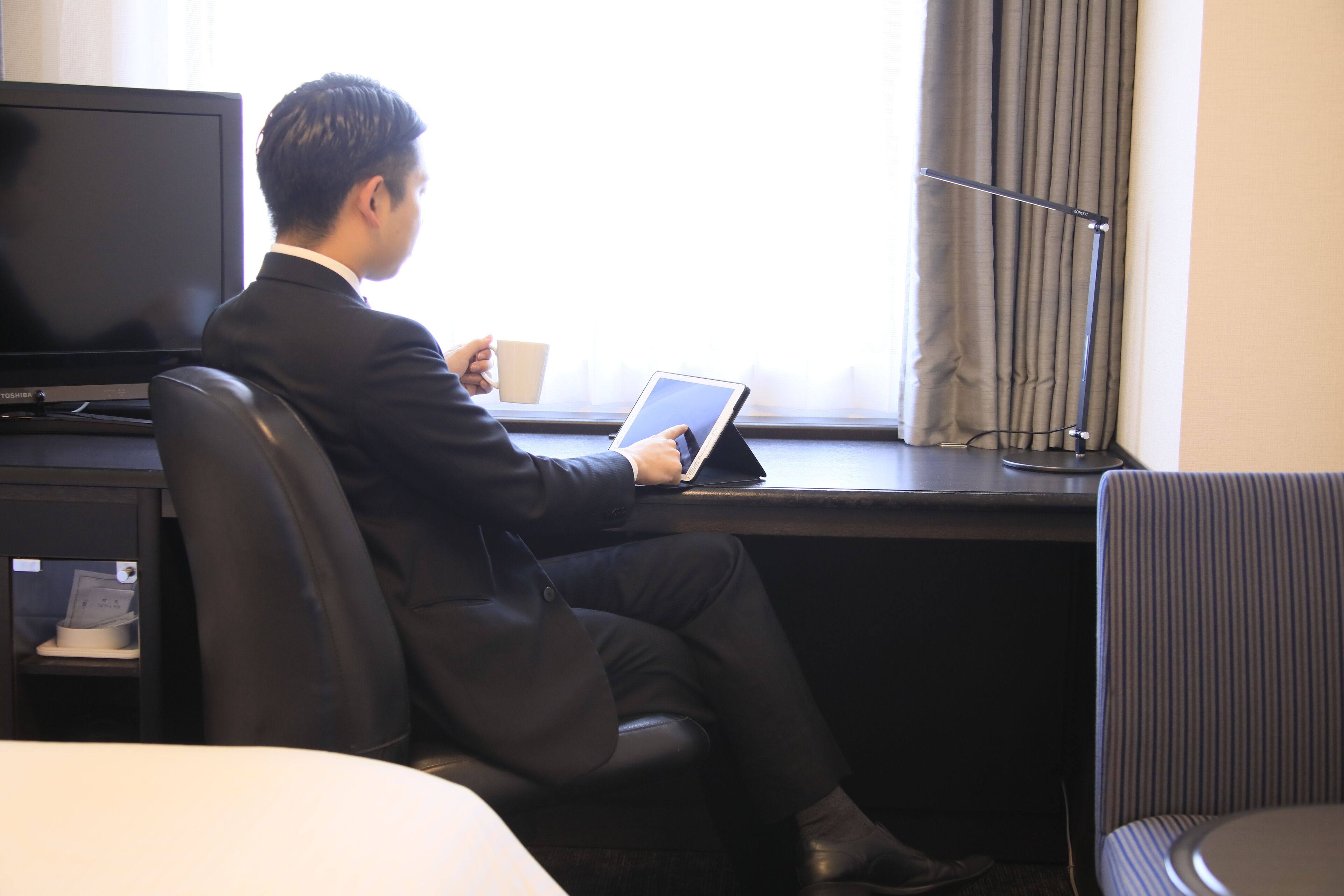 desk, blackout curtains, iron/ironing board, free wifi