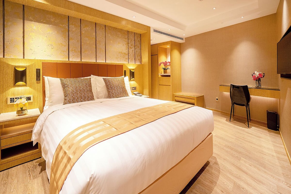 Ropa de cama de alta calidad, cubrecamas y minibar