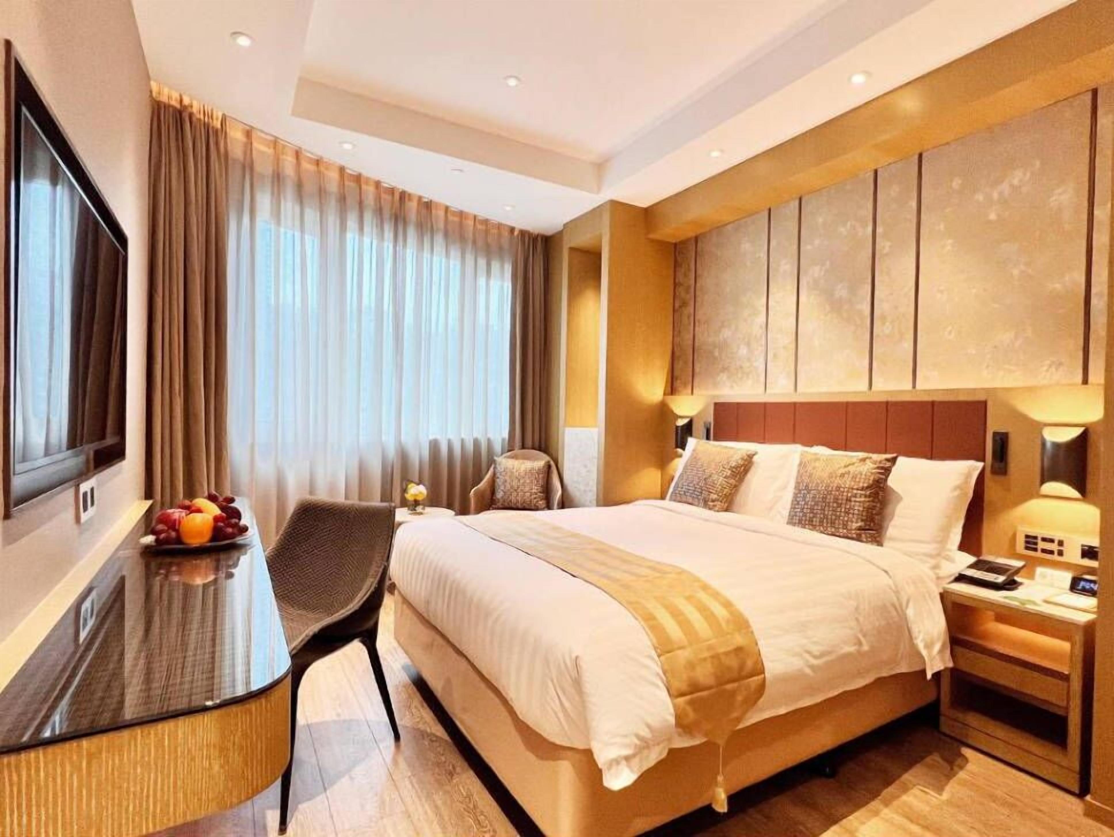 Ropa de cama de alta calidad, cubrecamas y minibar 