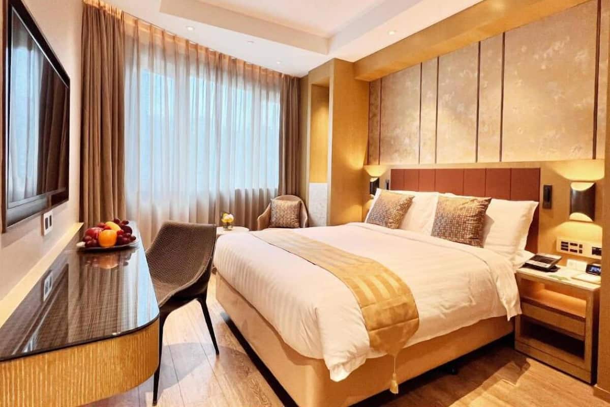 Ropa de cama de alta calidad, cubrecamas y minibar