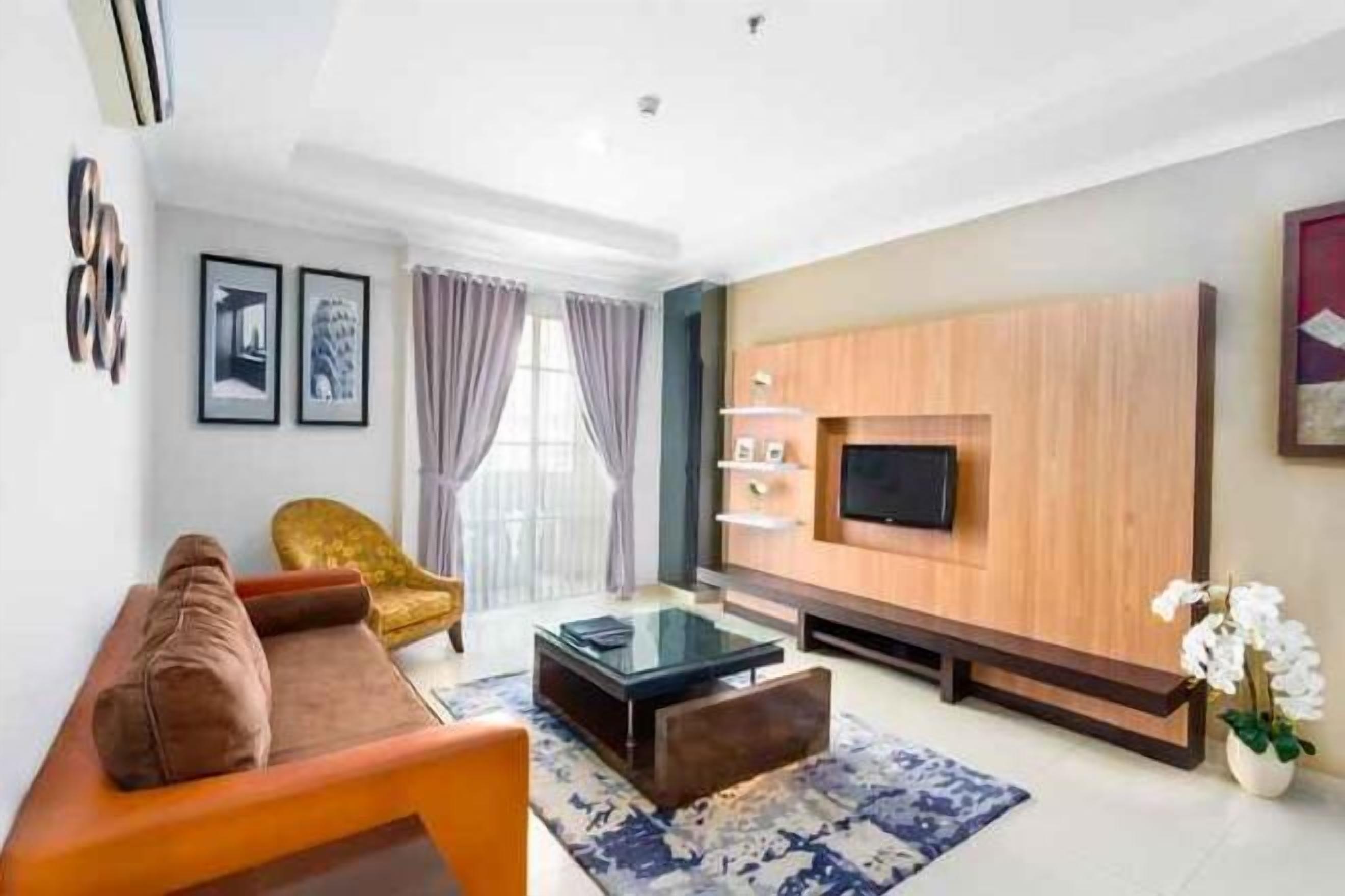 Flat-screen TV, iPod dock