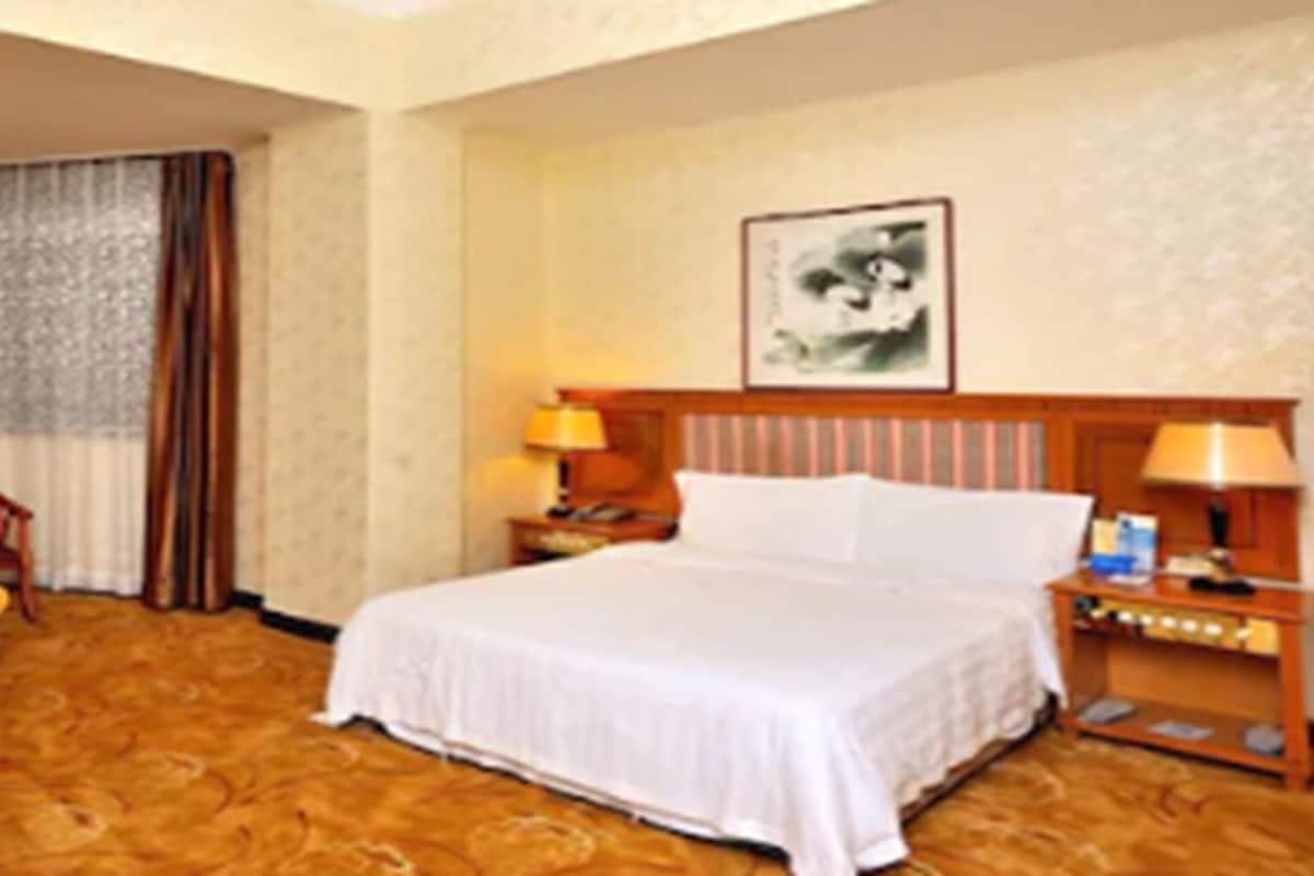 Colchones con pillow-top, minibar, escritorio y cortinas blackout