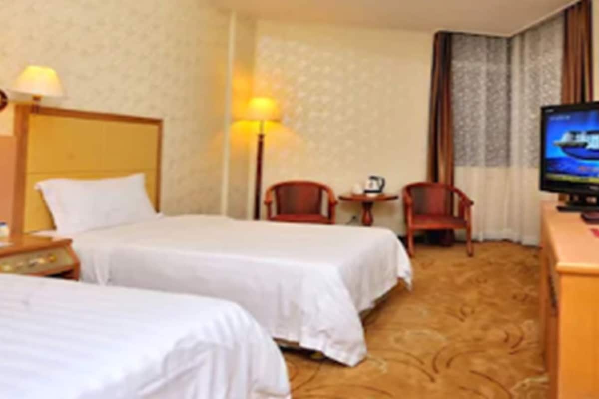 Colchones con pillow-top, minibar, escritorio y cortinas blackout