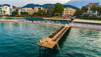 Private beach nearby, black sand, free beach cabanas, sun loungers