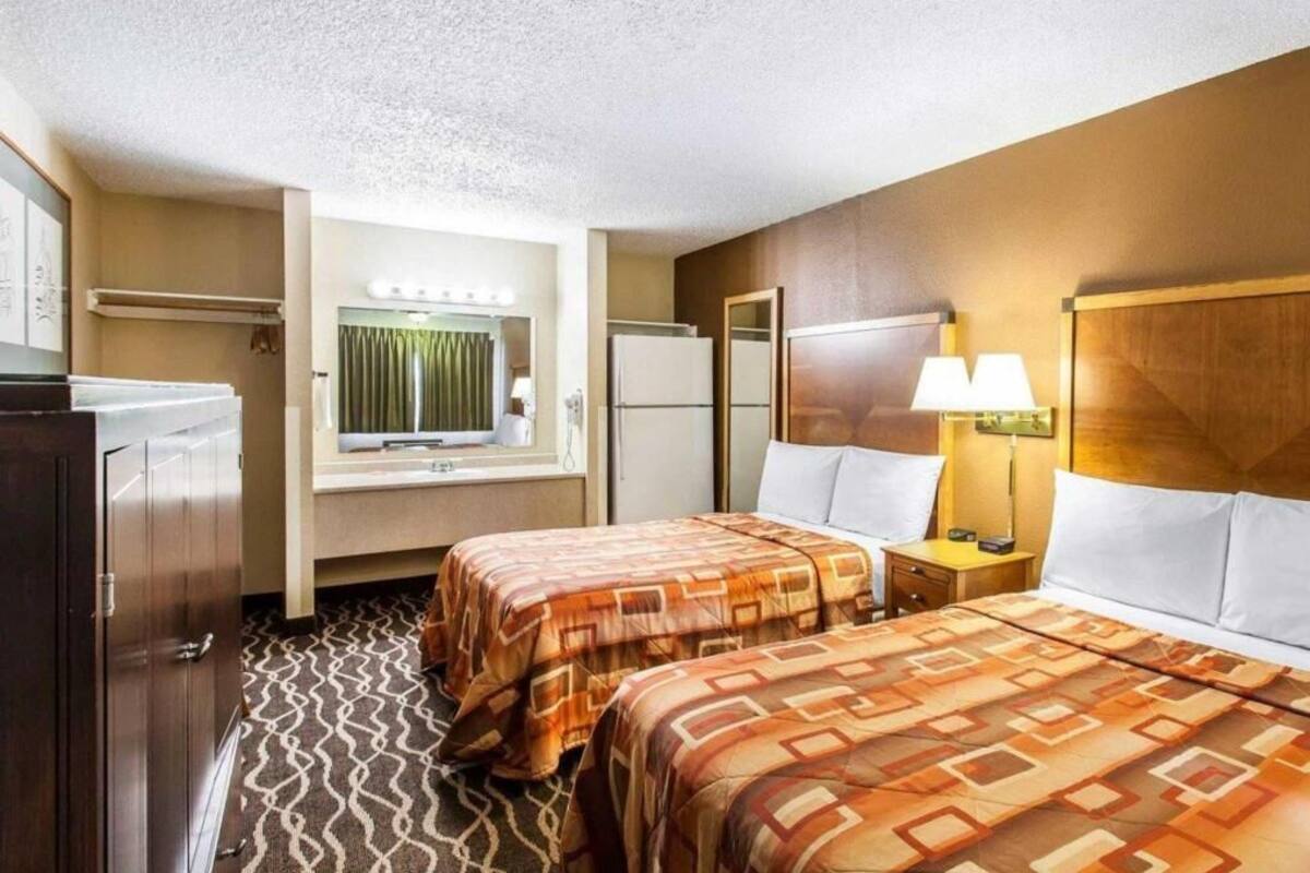 Premium bedding, desk, blackout curtains, iron/ironing board