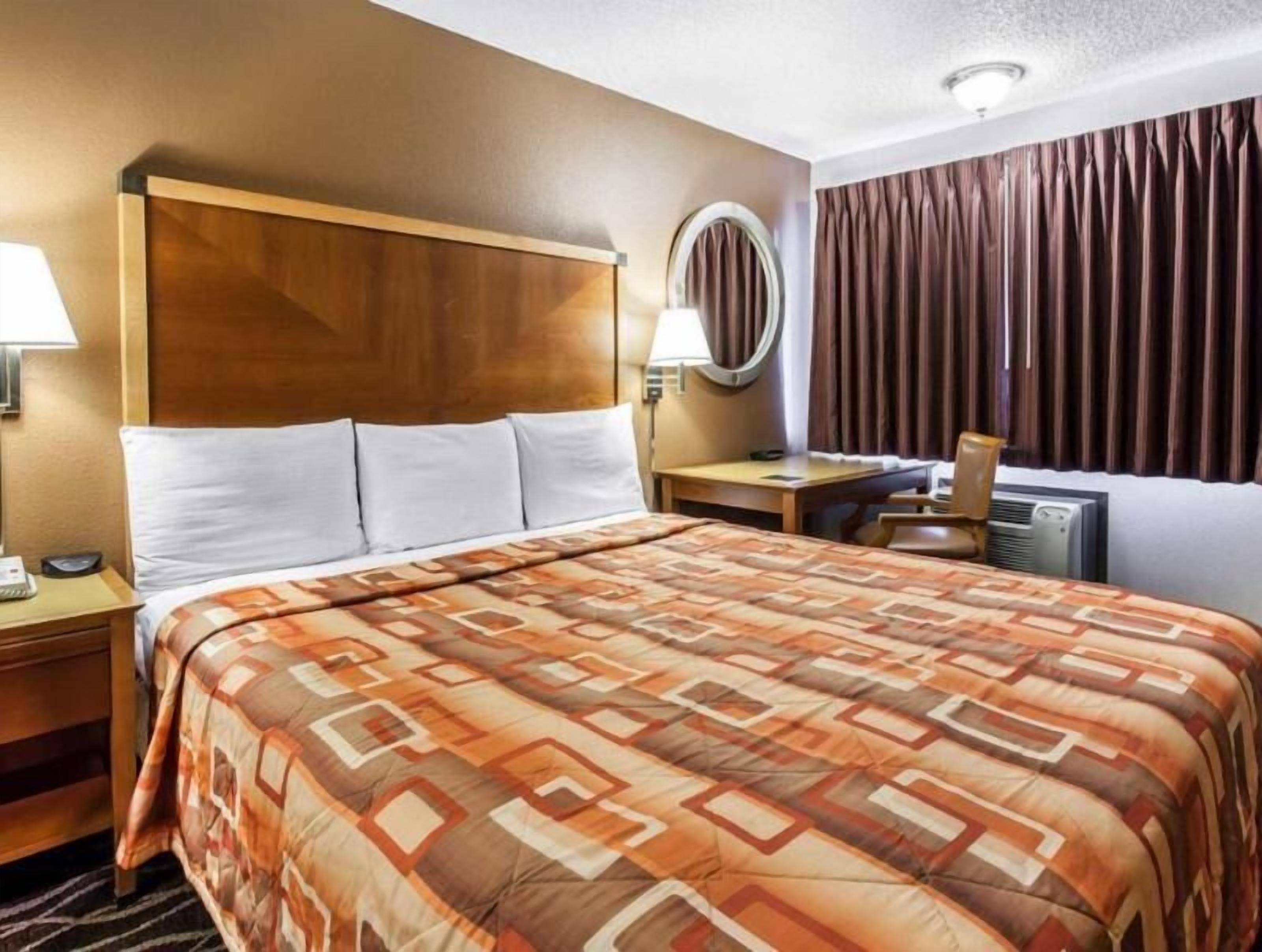 Premium bedding, desk, blackout curtains, iron/ironing board