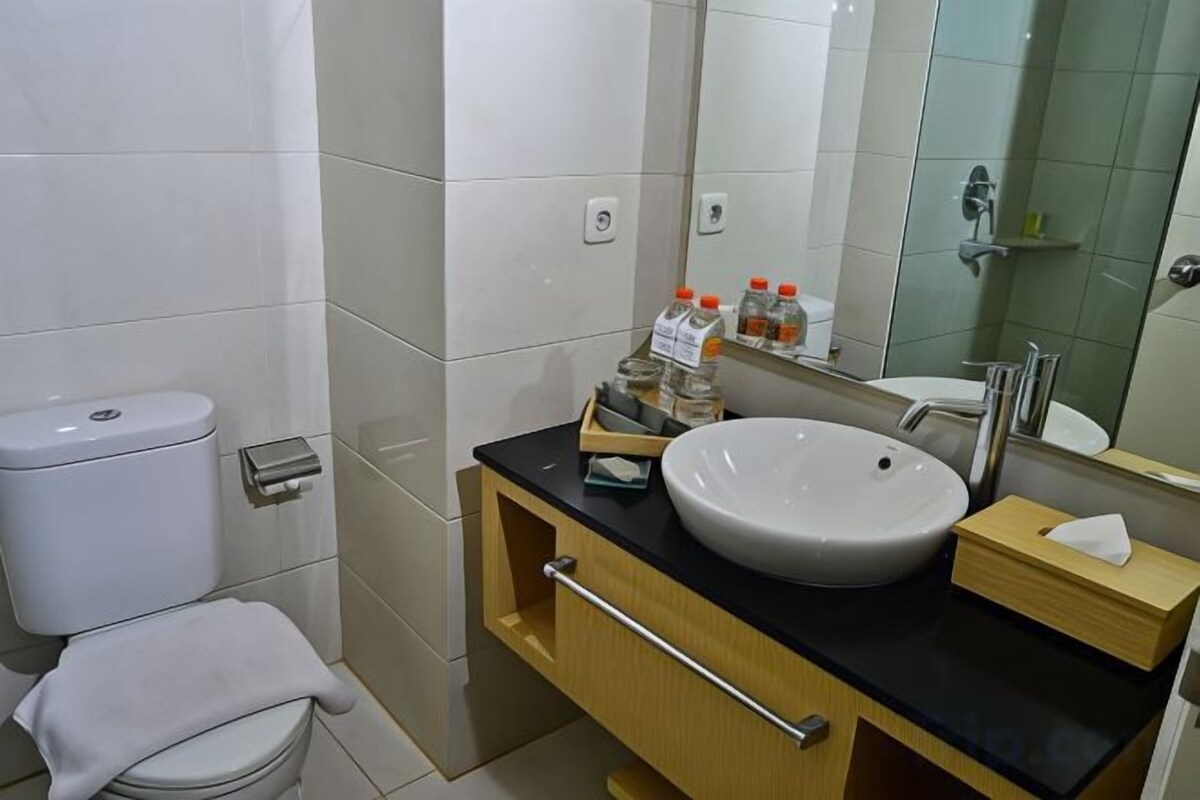 Bathroom | Shower, free toiletries, hair dryer (on request), slippers