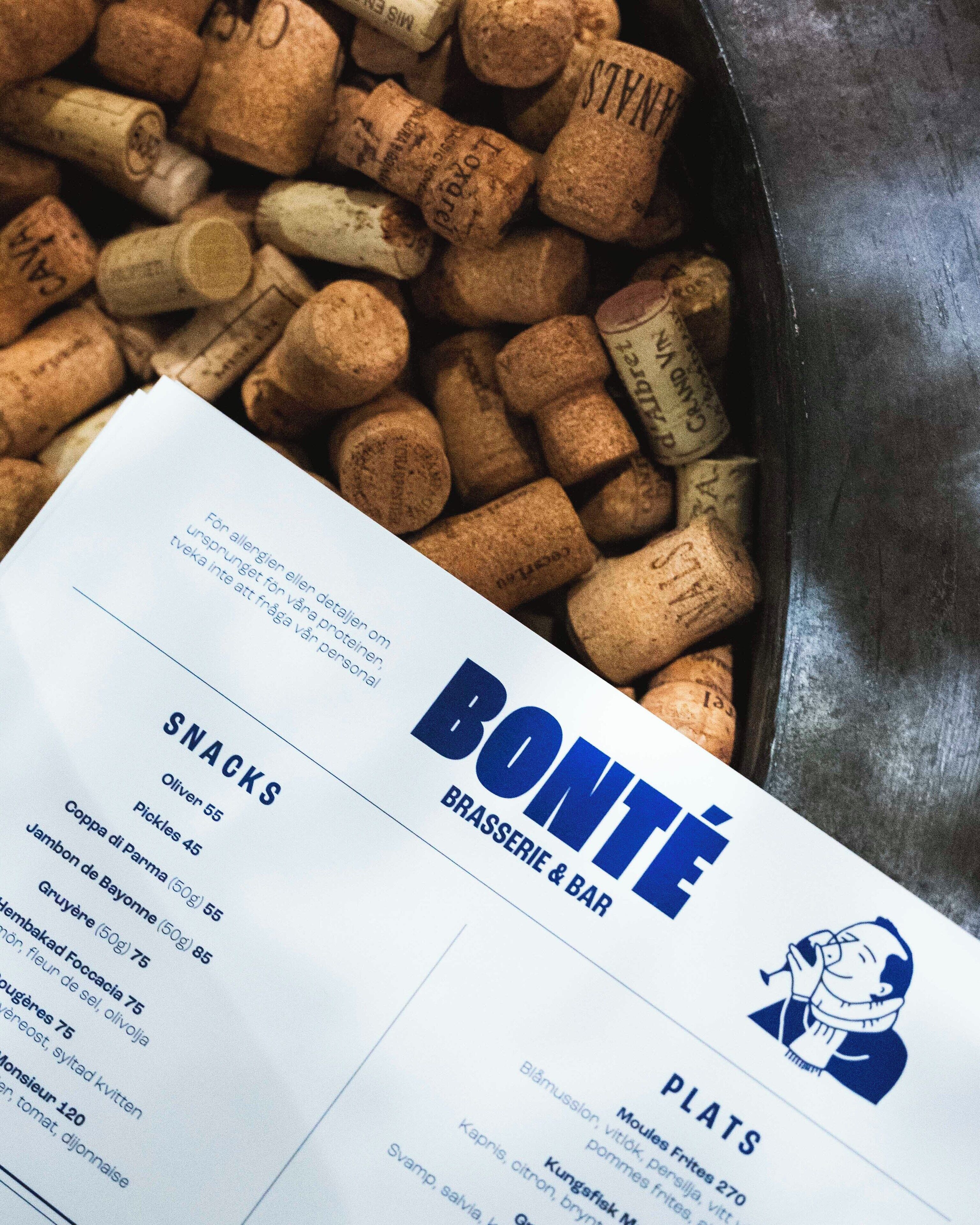 A menu from Bonté Brasserie & Bar with a list of snacks and dishes.