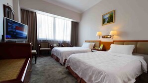 Pillowtop beds, minibar, desk, blackout drapes - The Overseas Chinese Building Hotel (Shenzhen)