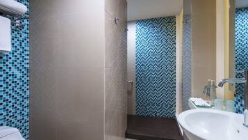 Suite, 1 King Bed | Bathroom | Shower, rainfall showerhead, free toiletries, hair dryer