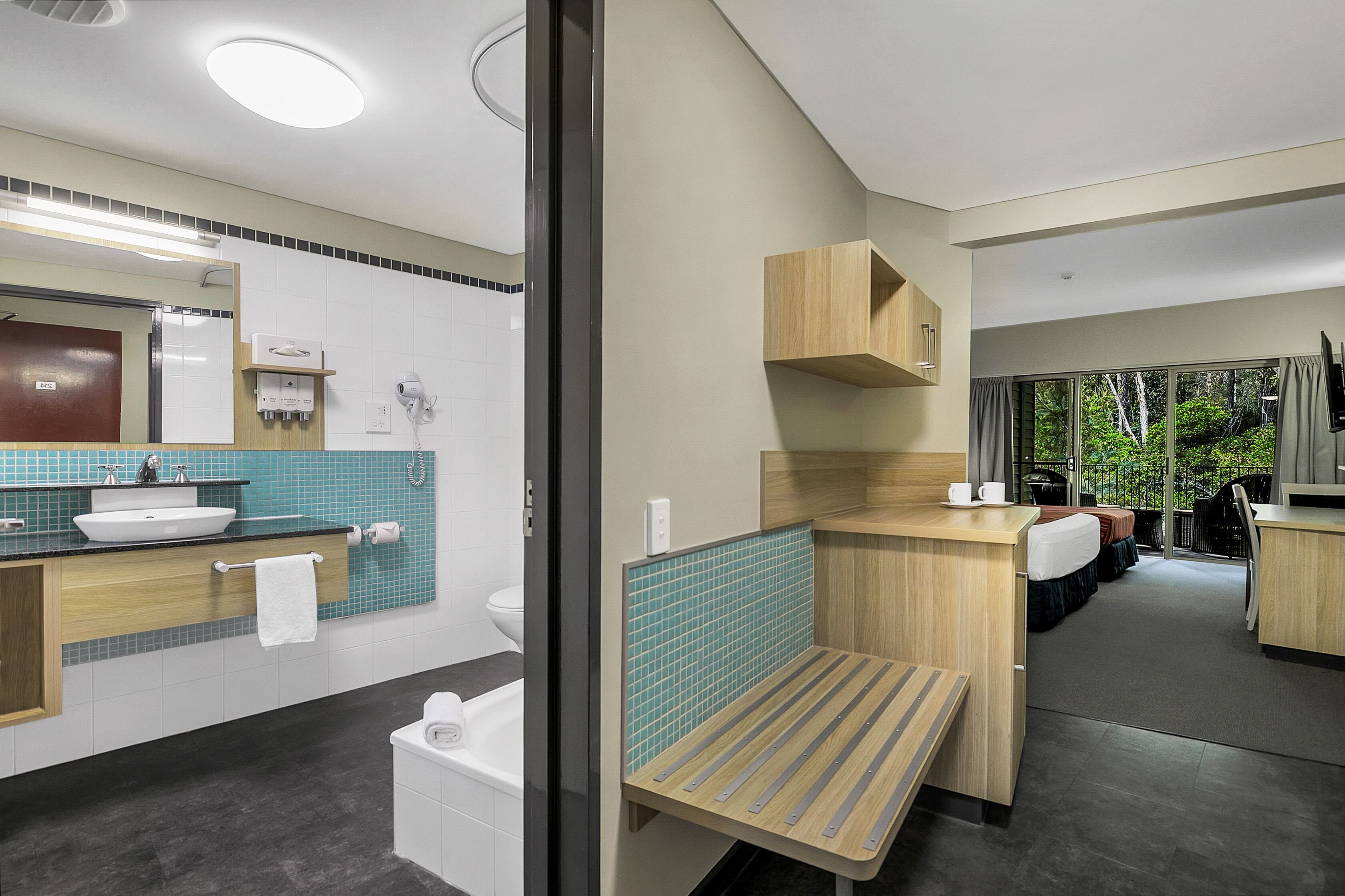 combined shower/bathtub, hair dryer, towels, soap