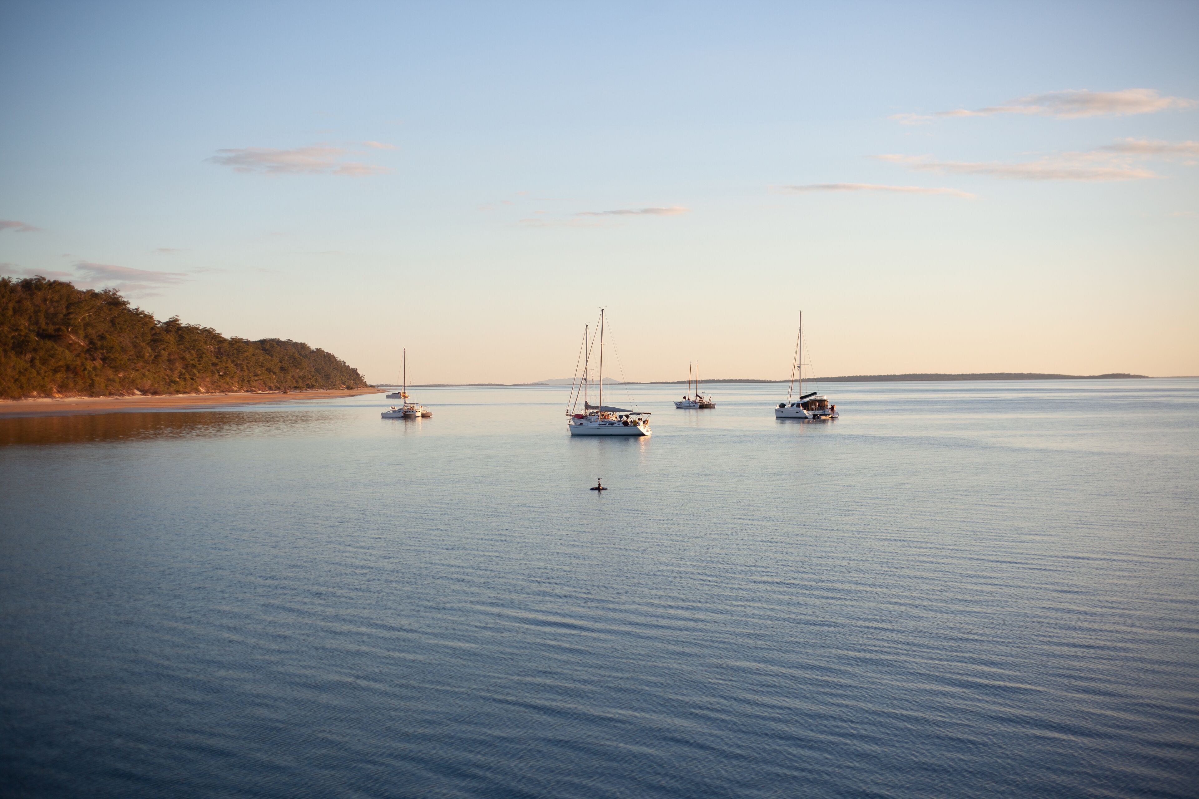 on the beach, sun-loungers, beach umbrellas, beach towels