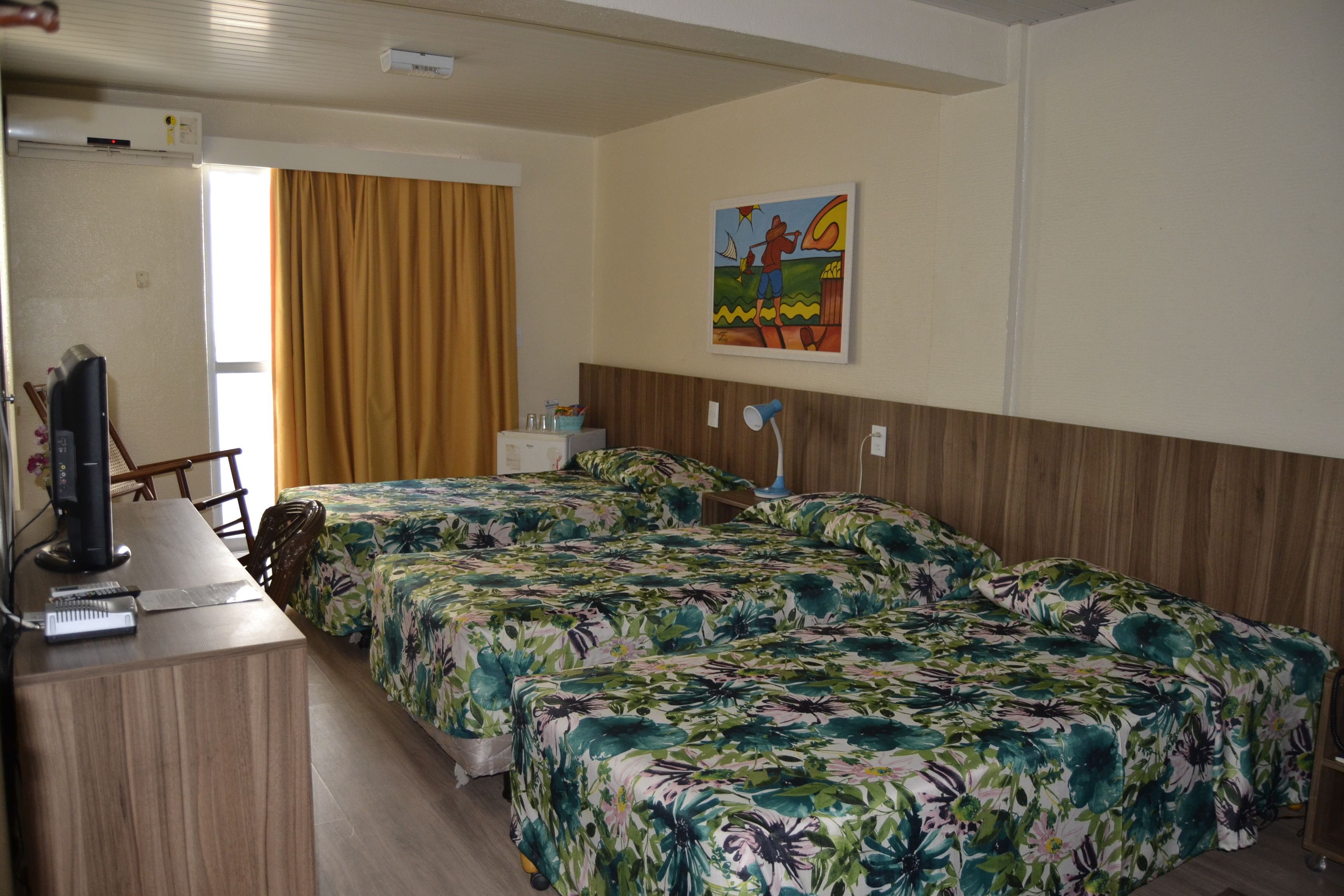 Standard Room | Minibar, in-room safe, individually decorated, desk