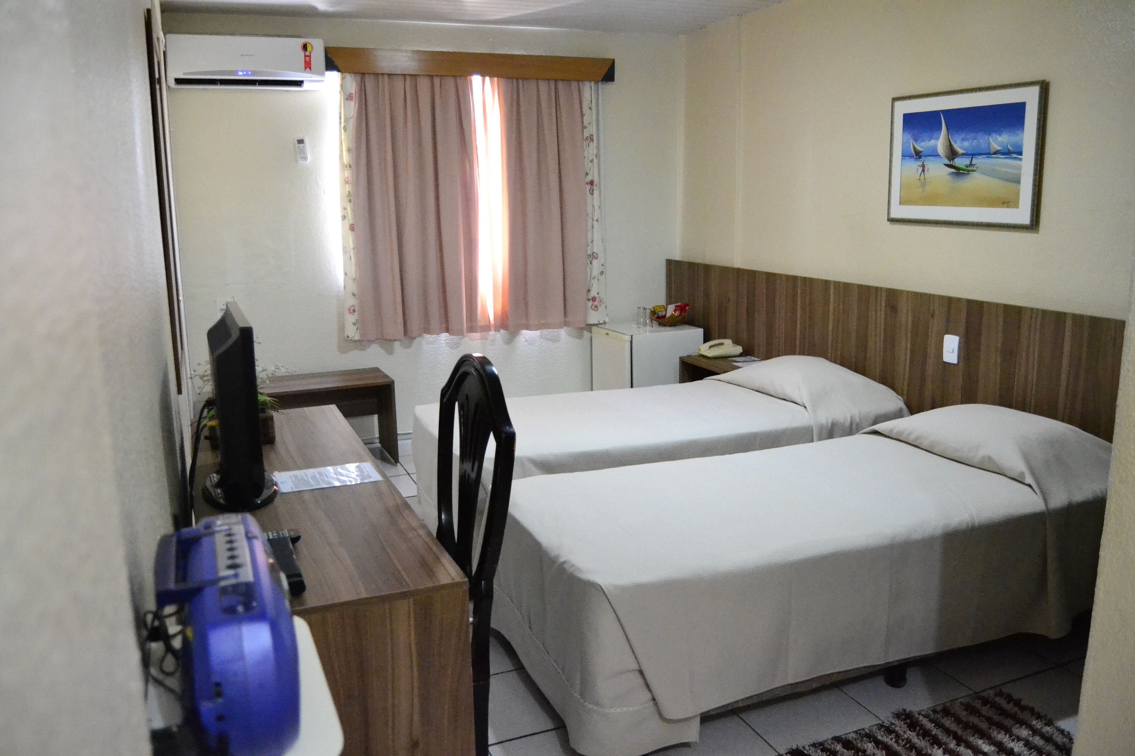 standard room | minibar, in-room safe, individually decorated, desk