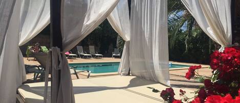 Outdoor pool, pool umbrellas, pool loungers