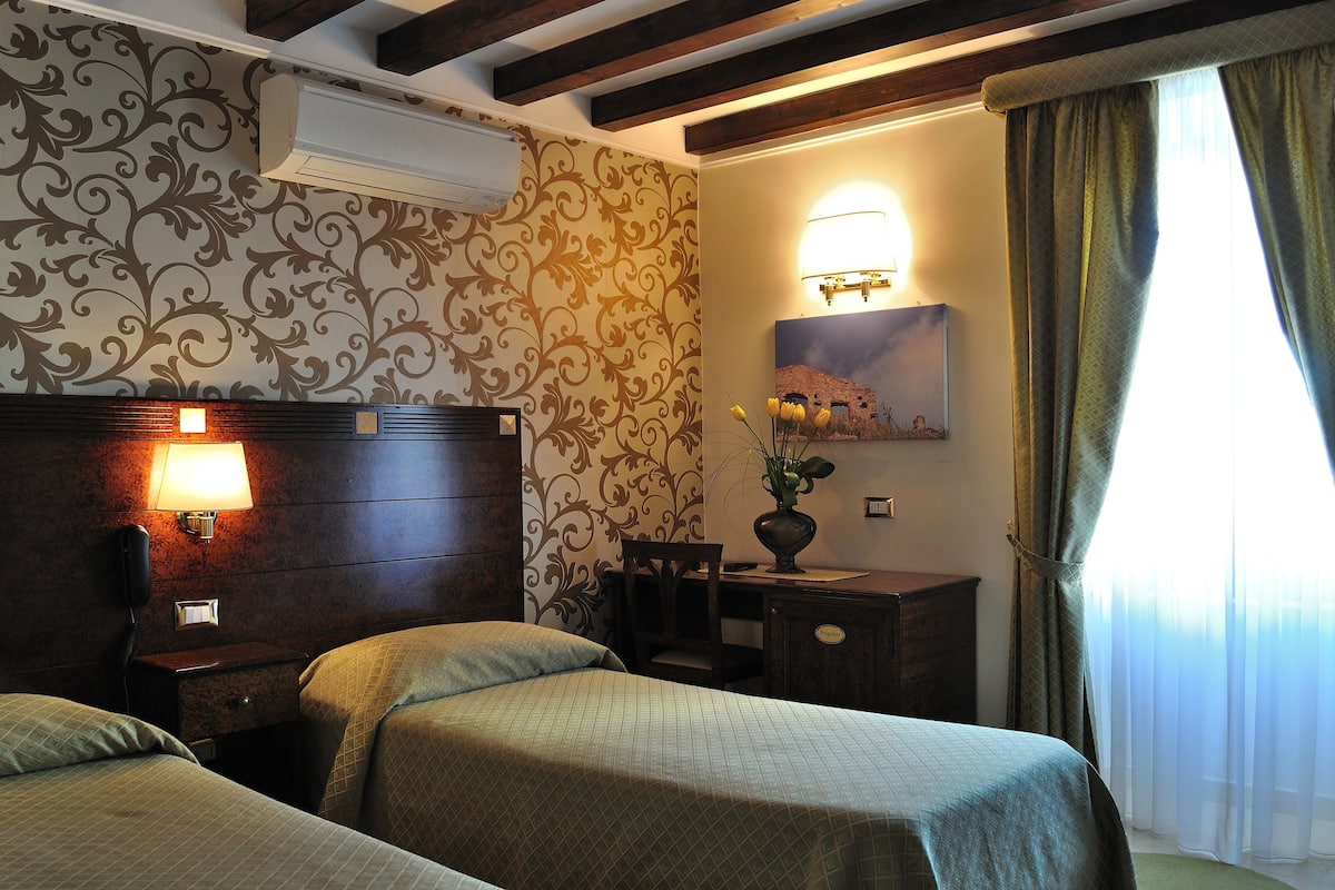 Premium bedding, pillow-top beds, minibar, desk