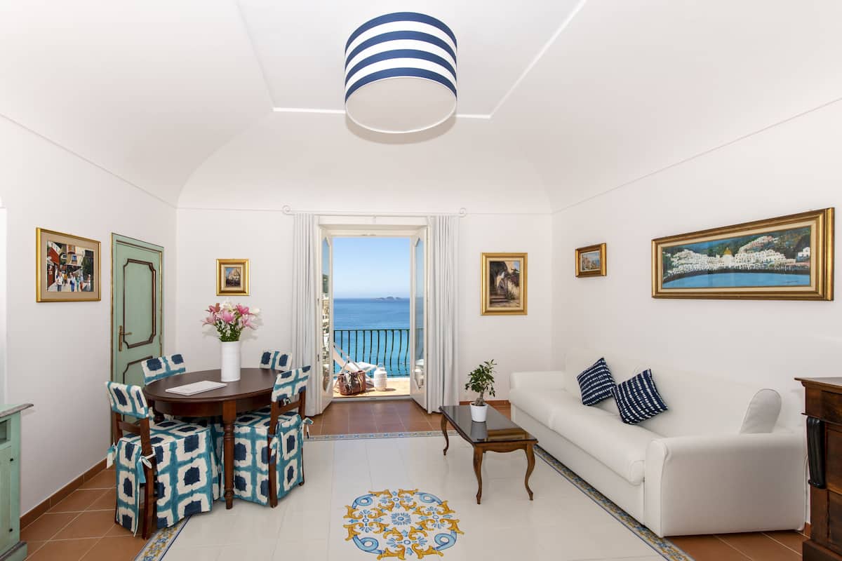 Superior Suite, Sea View | Living area | Plasma TV