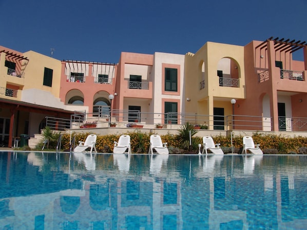 Seasonal outdoor pool, pool umbrellas, sun loungers
