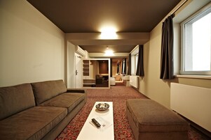 Standard Suite, 1 Double Bed with Sofa bed | Living area | LCD TV