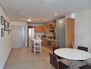 At Greenmarket Place | Living area | 32-inch LED TV with satellite channels, TV, DVD player - At Greenmarket Place (Cape Town)