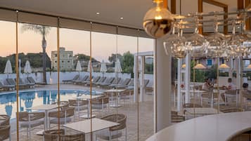 Breakfast, lunch, dinner served; pool views