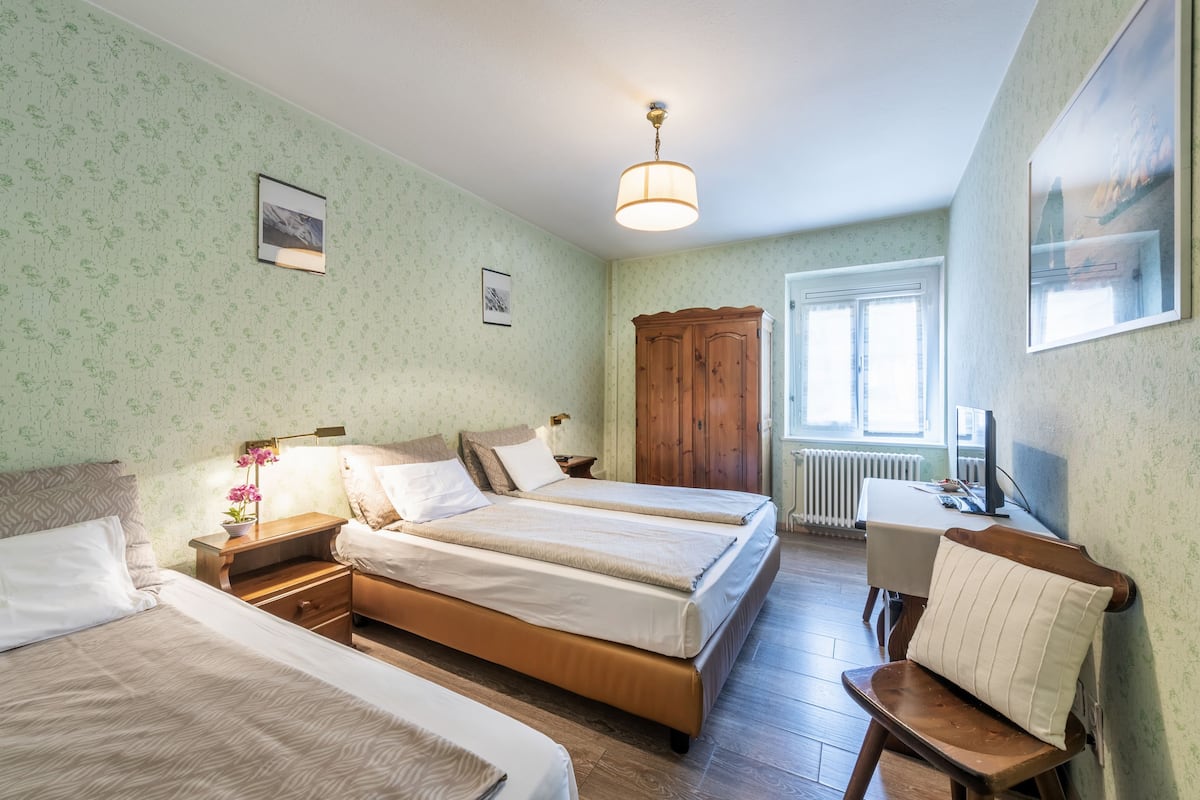 Triple Room, Mountain View | Minibar, desk, free WiFi, bed sheets