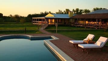 Seasonal outdoor pool, pool umbrellas