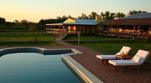 Seasonal outdoor pool, pool umbrellas