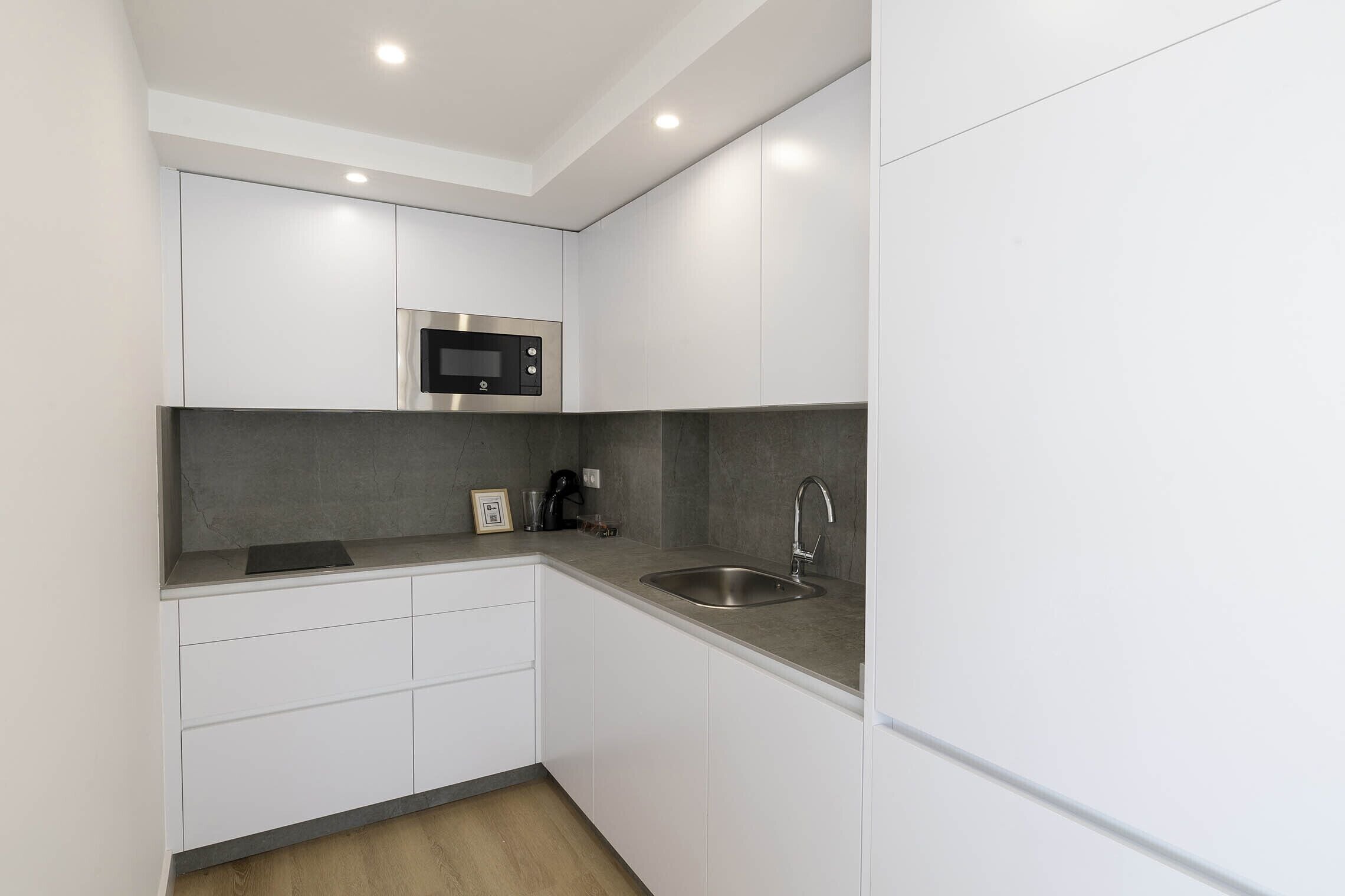 deluxe apartment | private kitchen | mini-fridge, microwave, stovetop, dishwasher