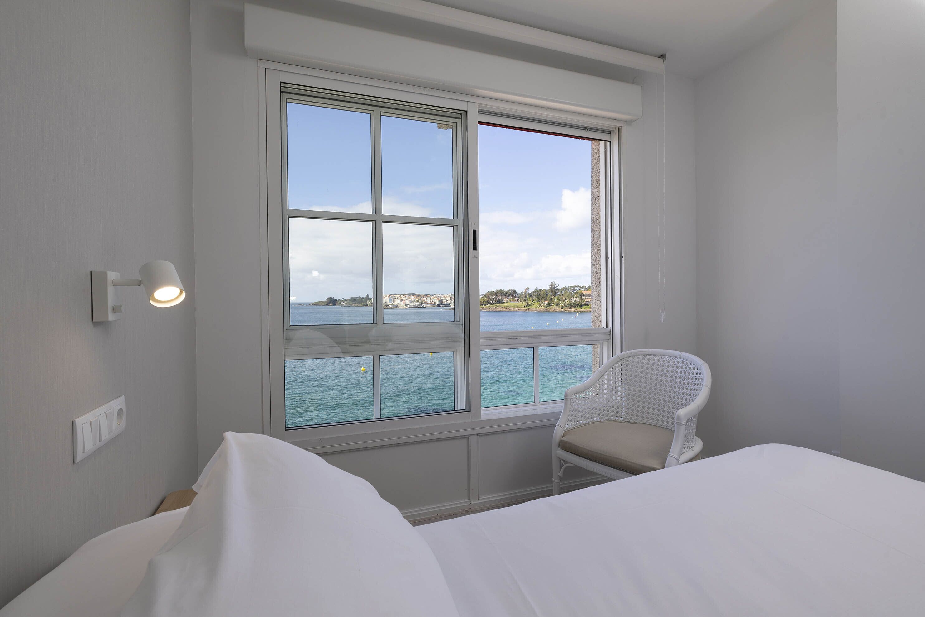 apartment, ocean view | 1 bedroom, down duvets, in-room safe, blackout curtains