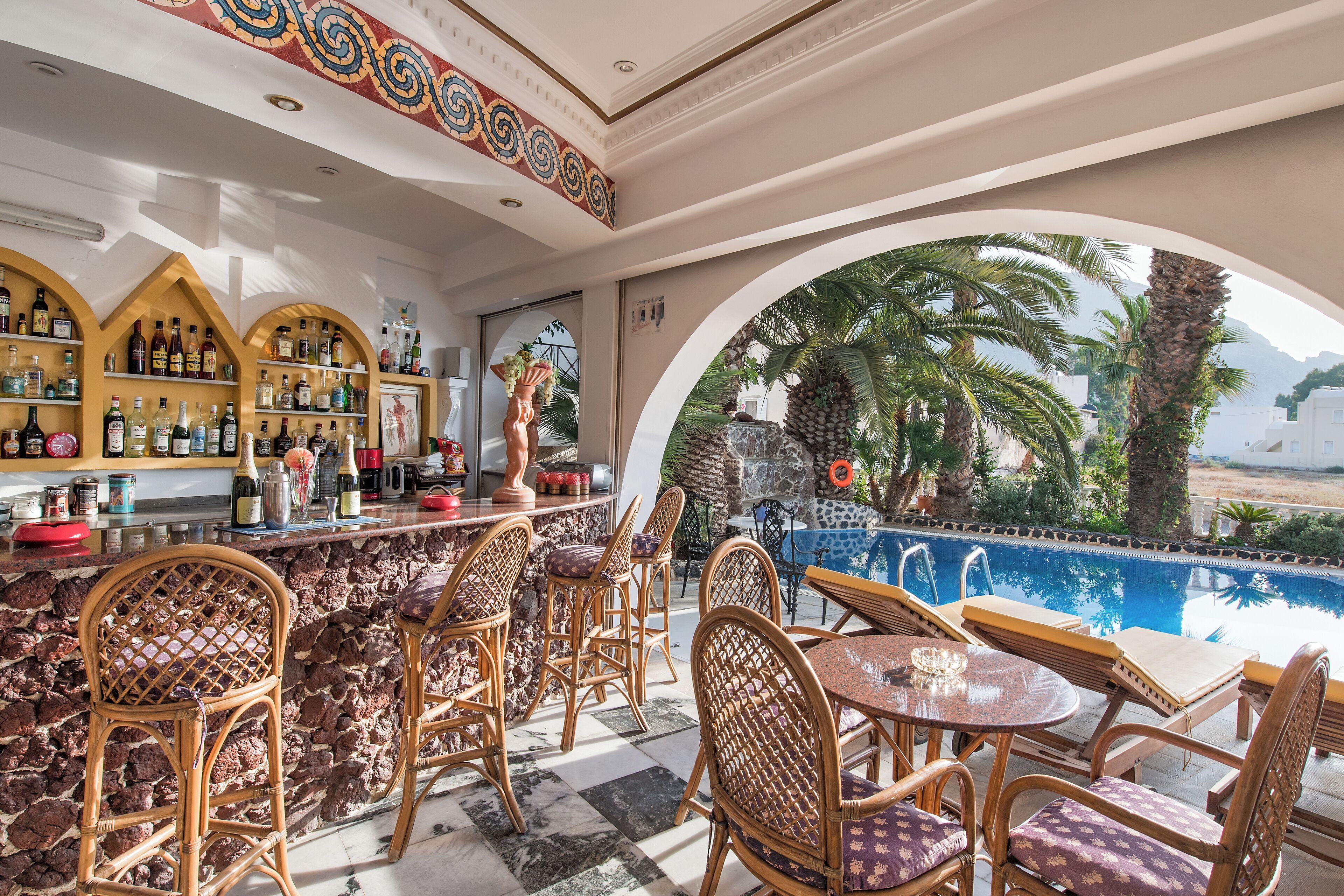 outdoor pool, open 8:00 am to 7:00 pm, pool umbrellas, pool loungers