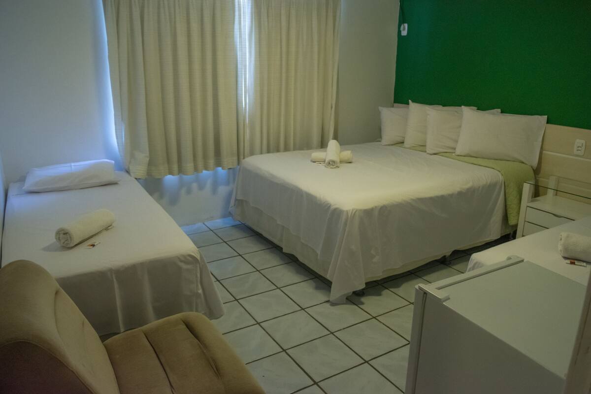 Standard Quadruple Room | Pillow-top beds, free WiFi, bed sheets