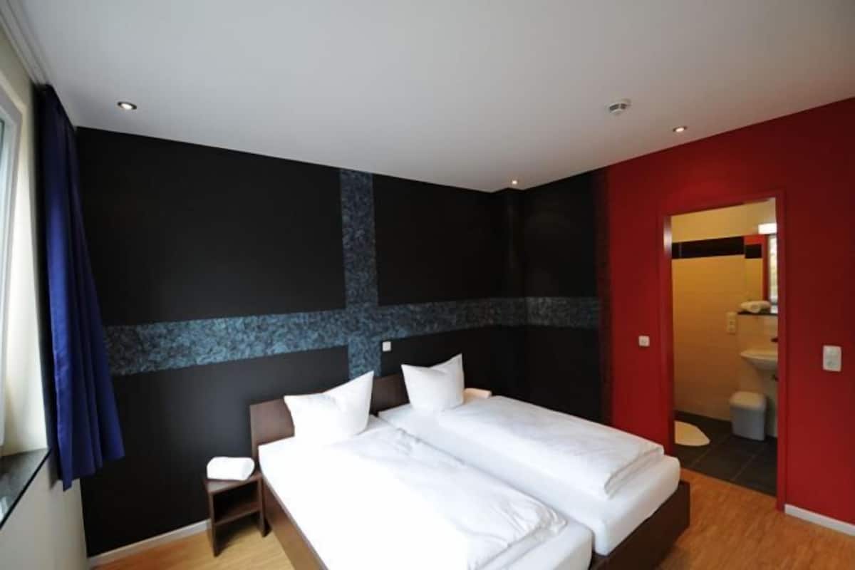 Blackout curtains, free WiFi, bed sheets