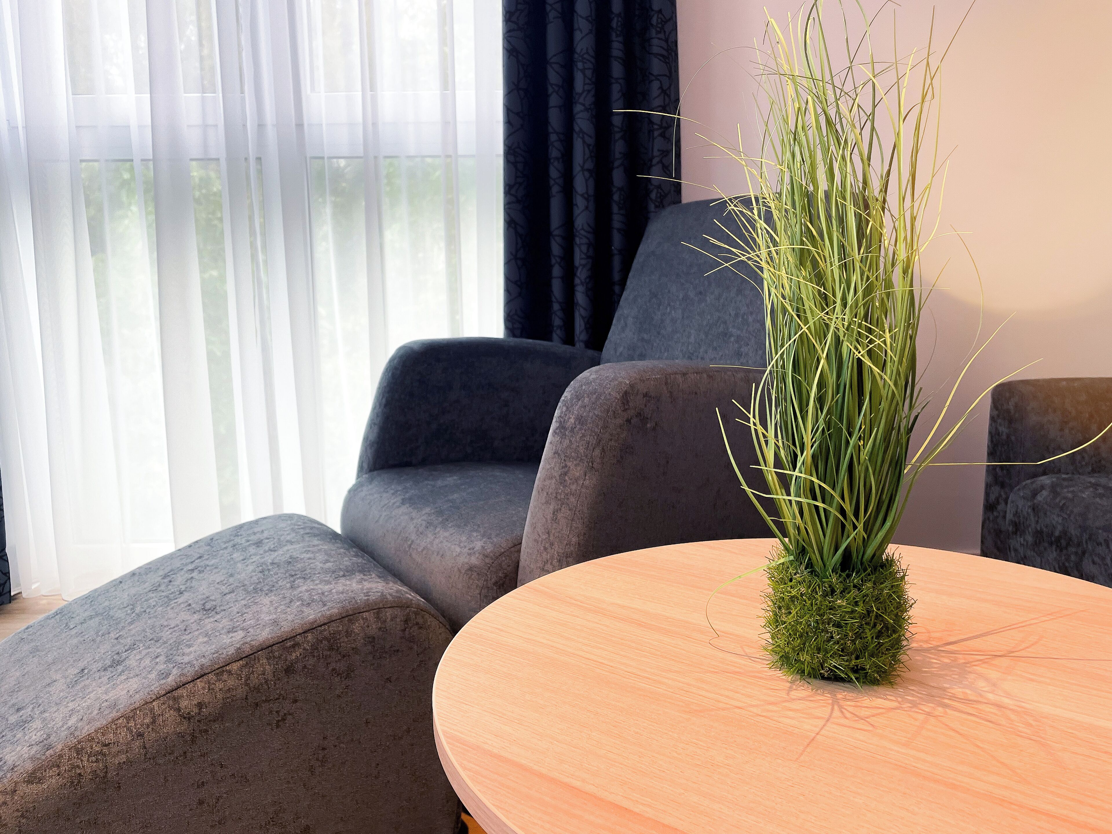 Family Apartment | Living area | 55-inch flat-screen TV with digital channels, tablet