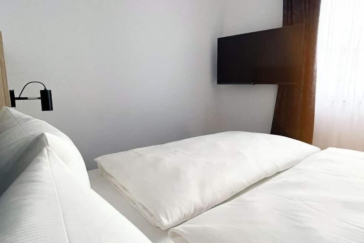 Blackout curtains, free WiFi, bed sheets