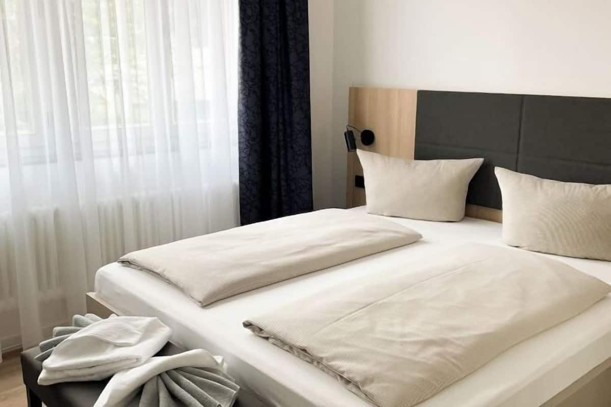 Blackout curtains, free WiFi, bed sheets