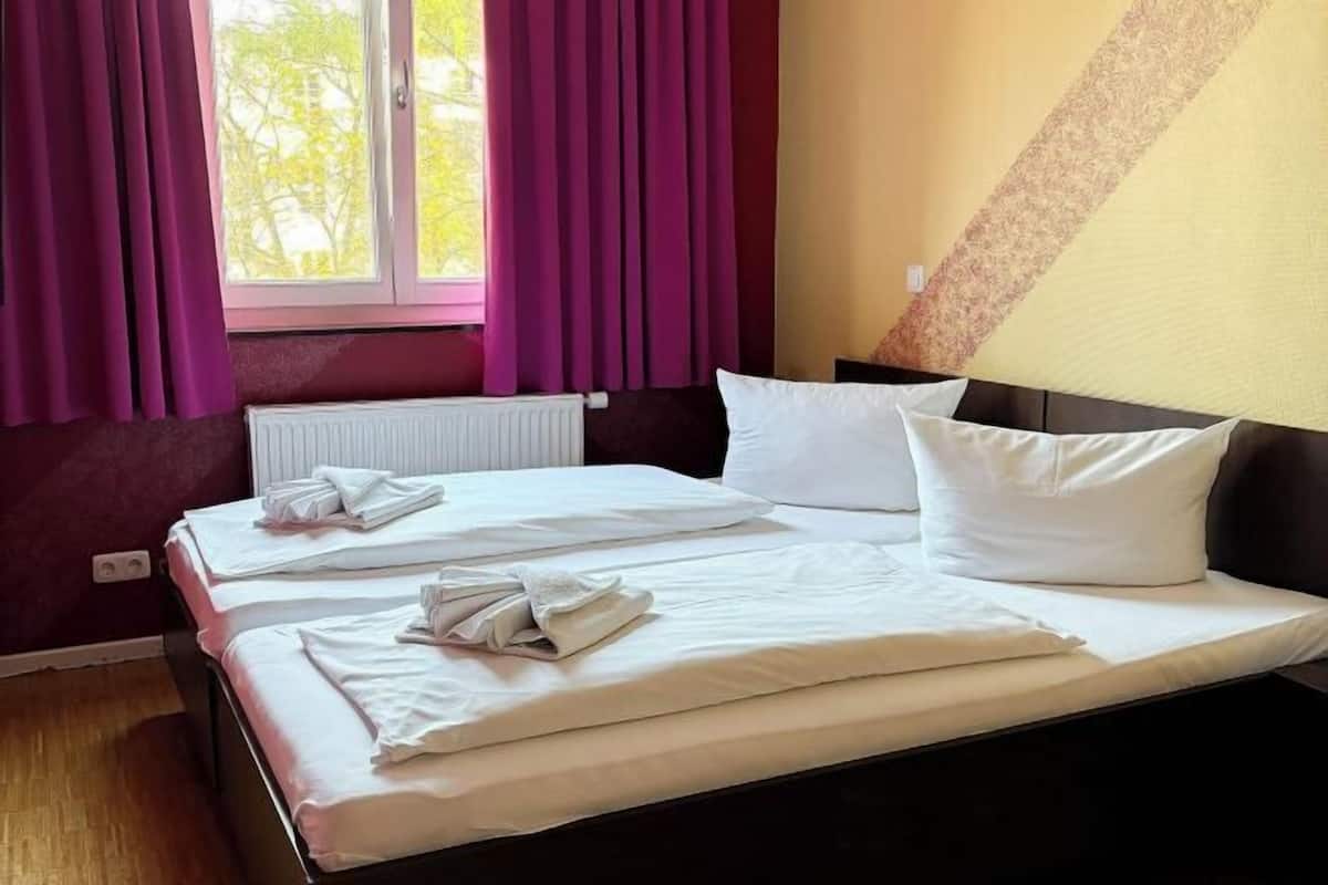 Blackout curtains, free WiFi, bed sheets