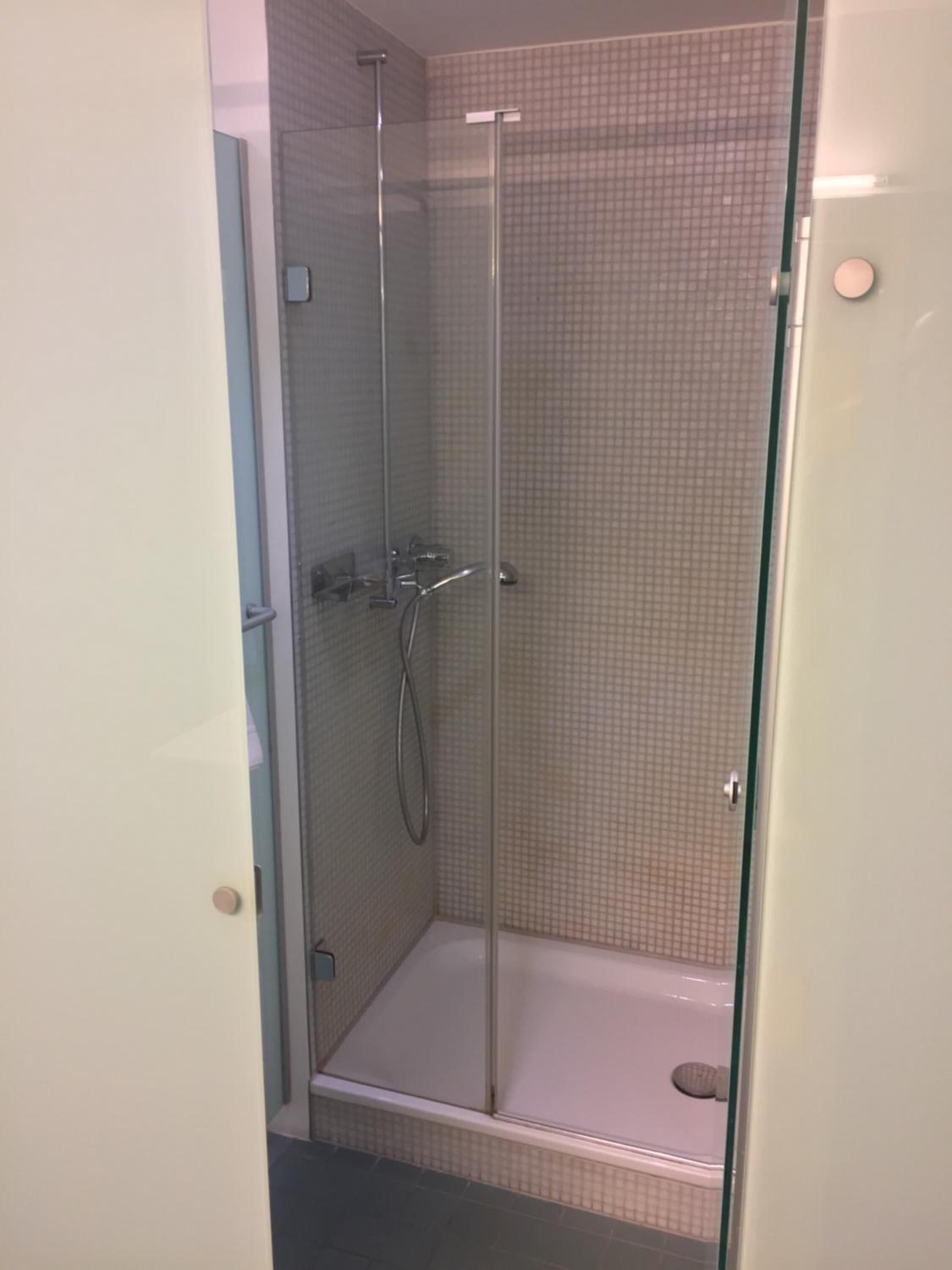 shower, hair dryer, bathrobes, towels