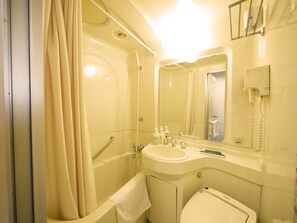 Combined shower/bathtub, hair dryer, slippers, towels