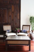 Standard Room | Living area | 40-inch LCD TV with cable channels, TV, DVD player