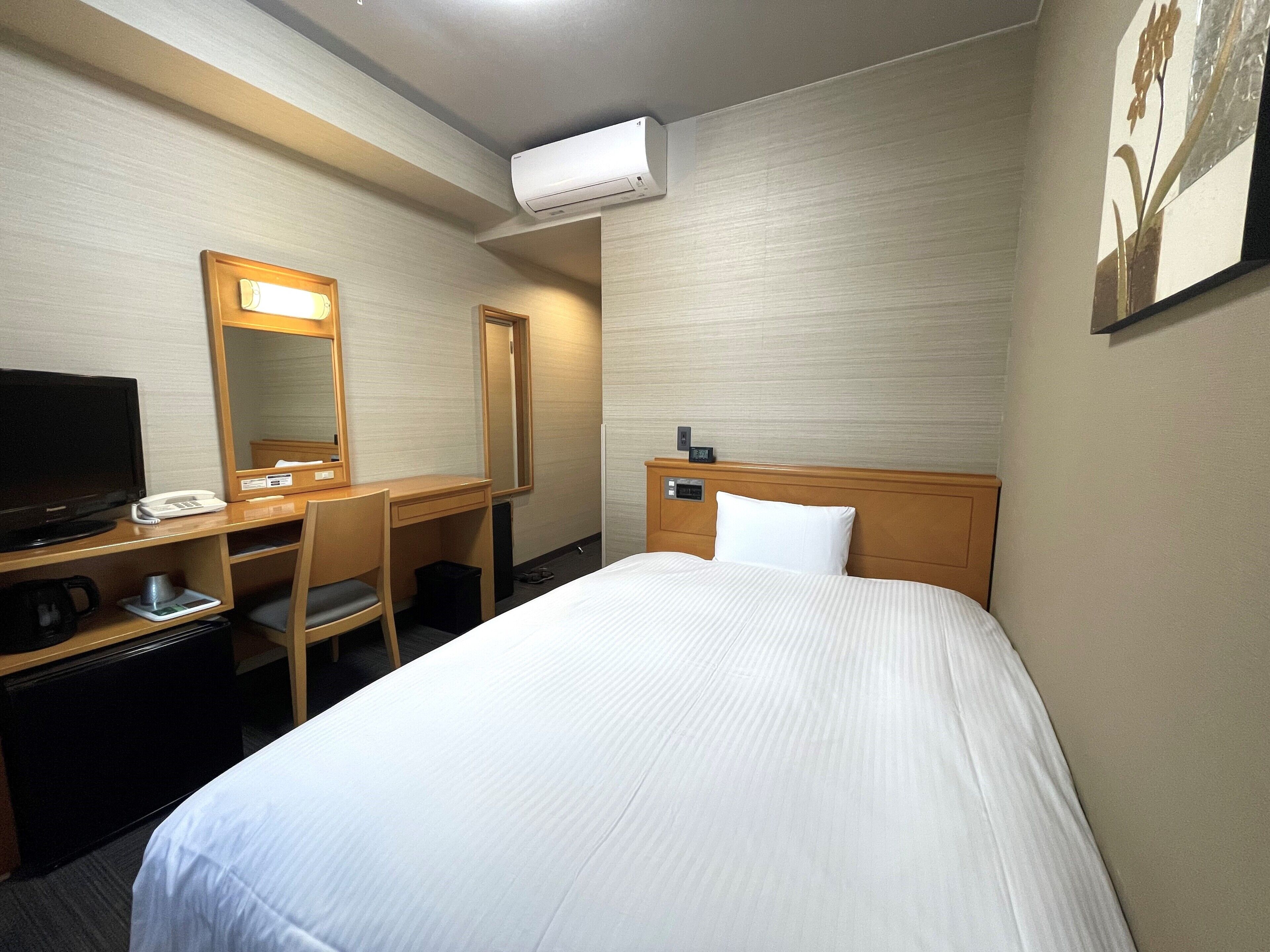 Desk, free WiFi, bed sheets