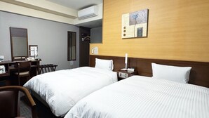 A hotel room with two beds, a desk, a chair, an air conditioning unit, and a painting on the wall. - Hotel Route-Inn Isahaya Inter (Isahaya)