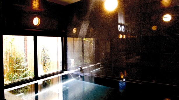 A modern indoor pool area with large windows, a clear view of the outside, and a polished floor. - Hotel Route - Inn Saga Ekimae (Saga)