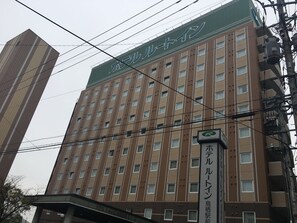 Route Inn offers standard rooms with a functional design.